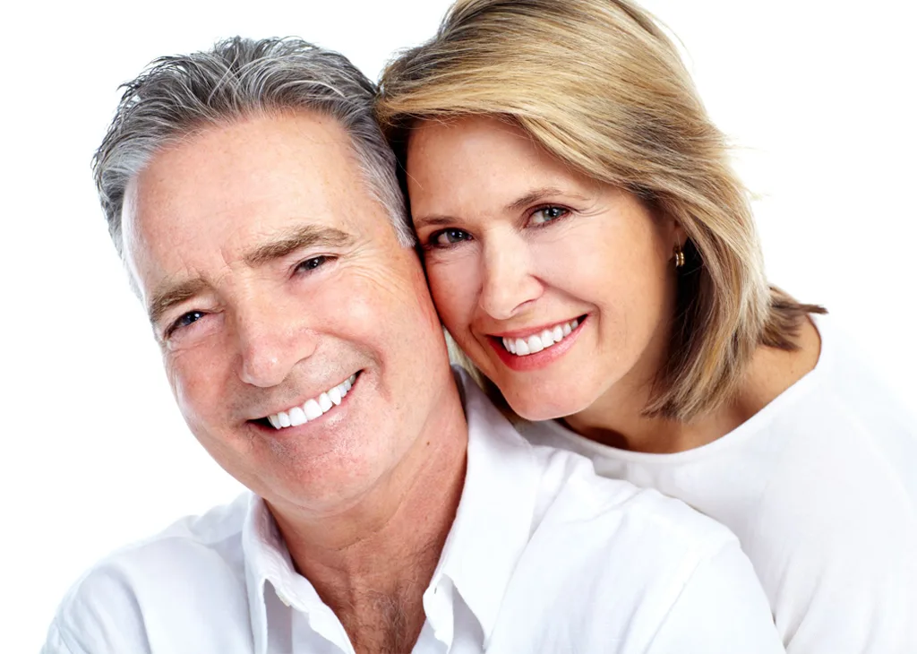 Patient smiling confidently with dentures at Krutav Patel DDS in Claremont